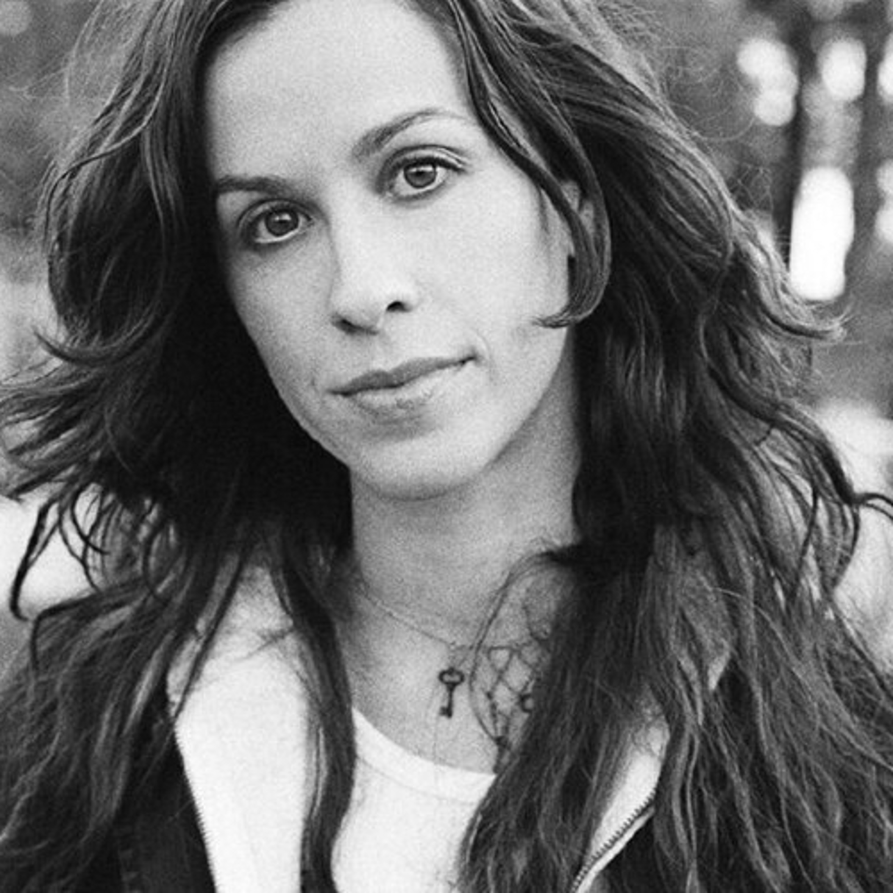 "Alanis Morissette Recounts Disastrous Sexual Encounter With Multiple Men At Age 15" episode artwork