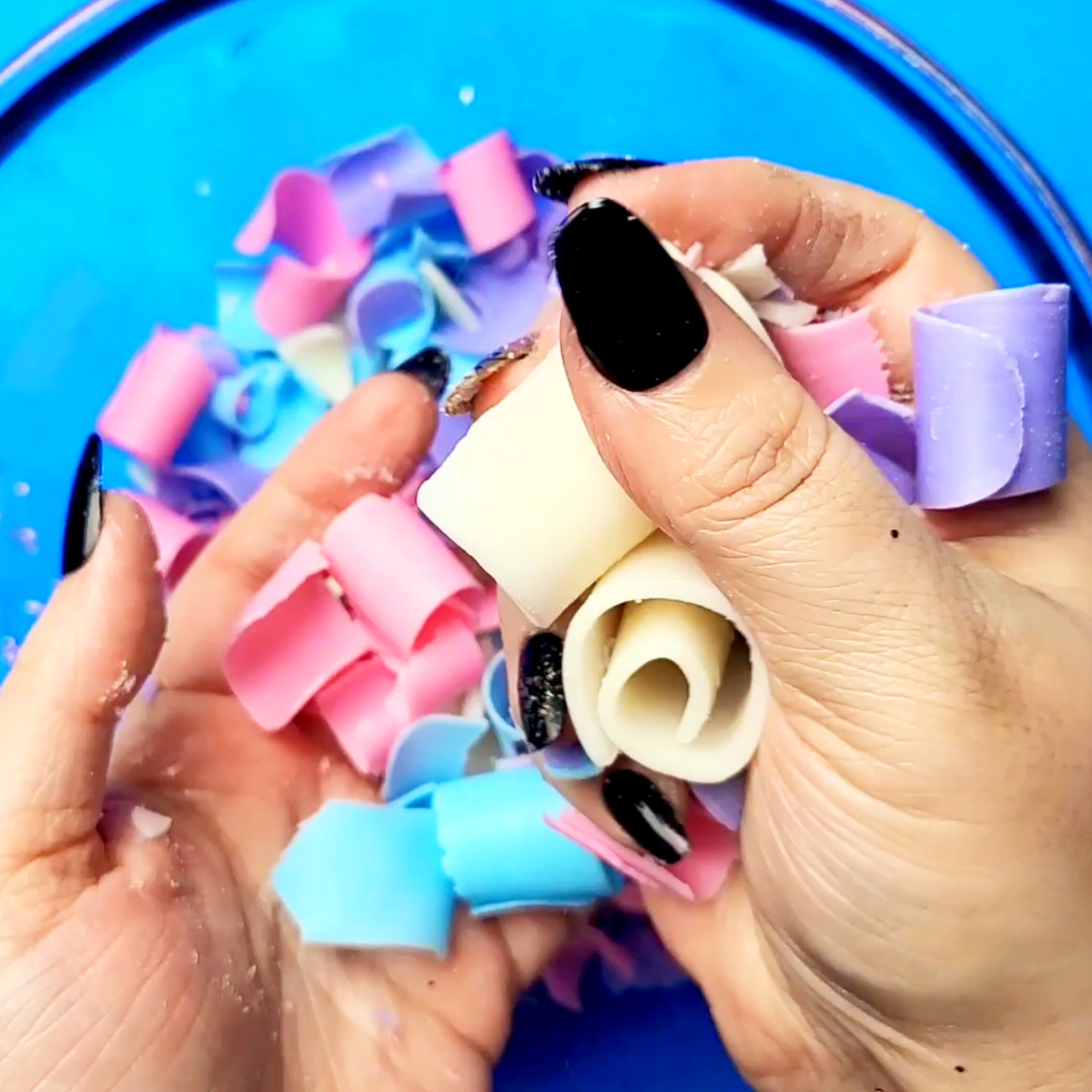 Crushing Soap Curls in a Glass Bowl
