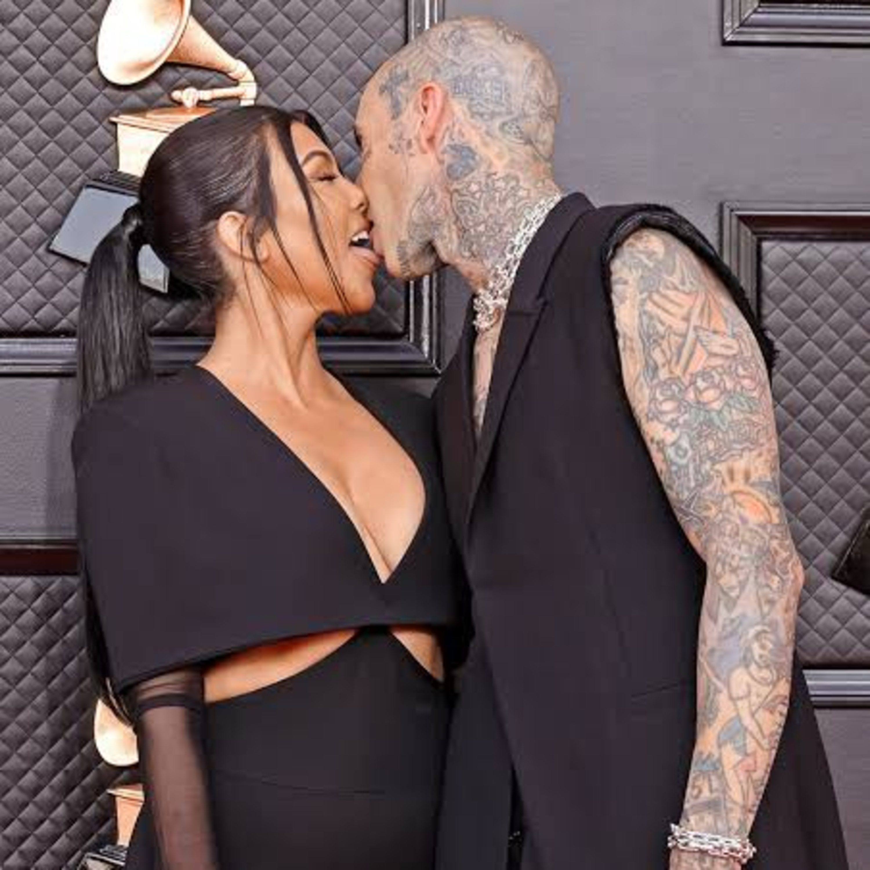 Travis Barker tackles a hater that mocked his and Kourtney Kardashian’s public displays of affection on Instagram. episode artwork