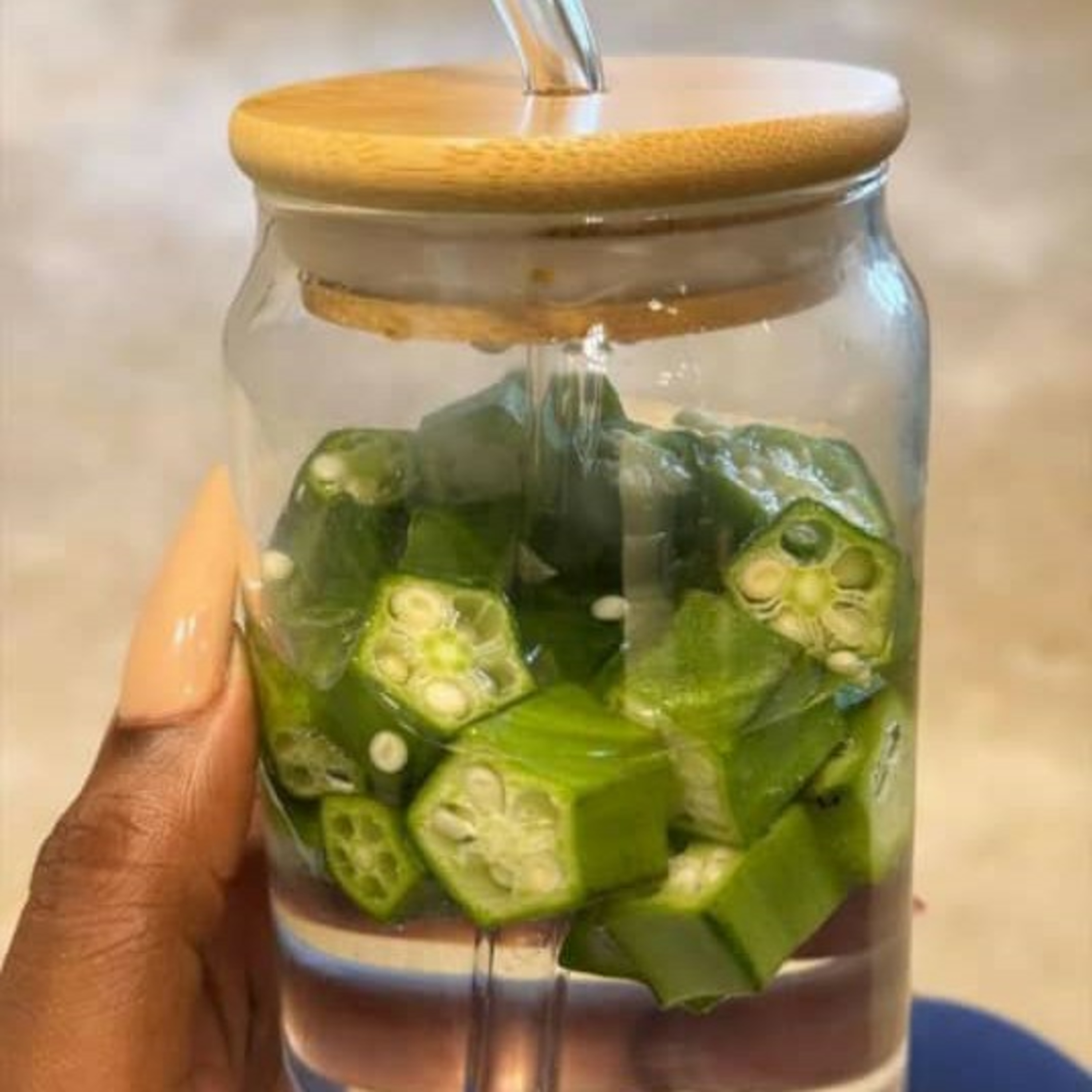 Tiwa Savage sets social media on fire after posting a picture of herself holding a jar of Okro water episode artwork