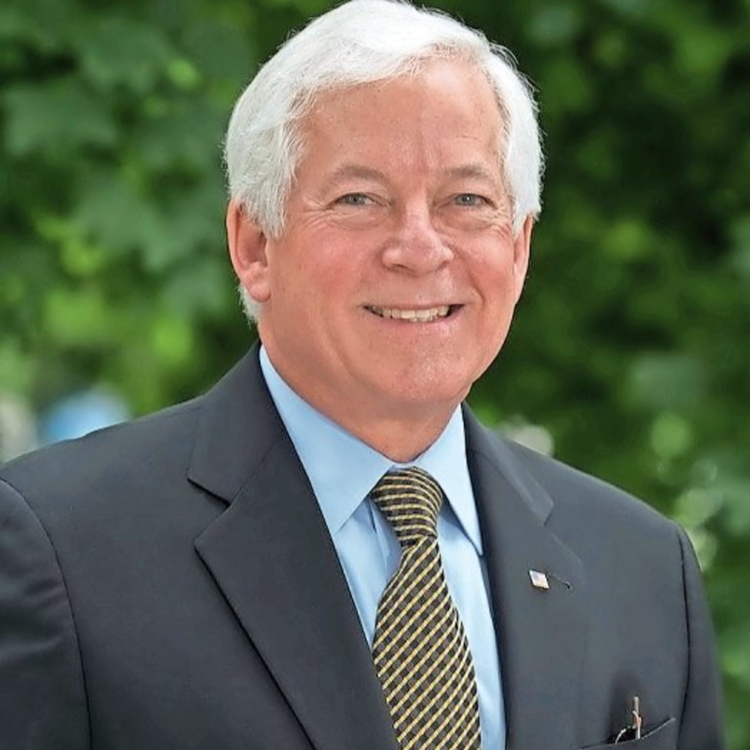 Commissioner in a Car