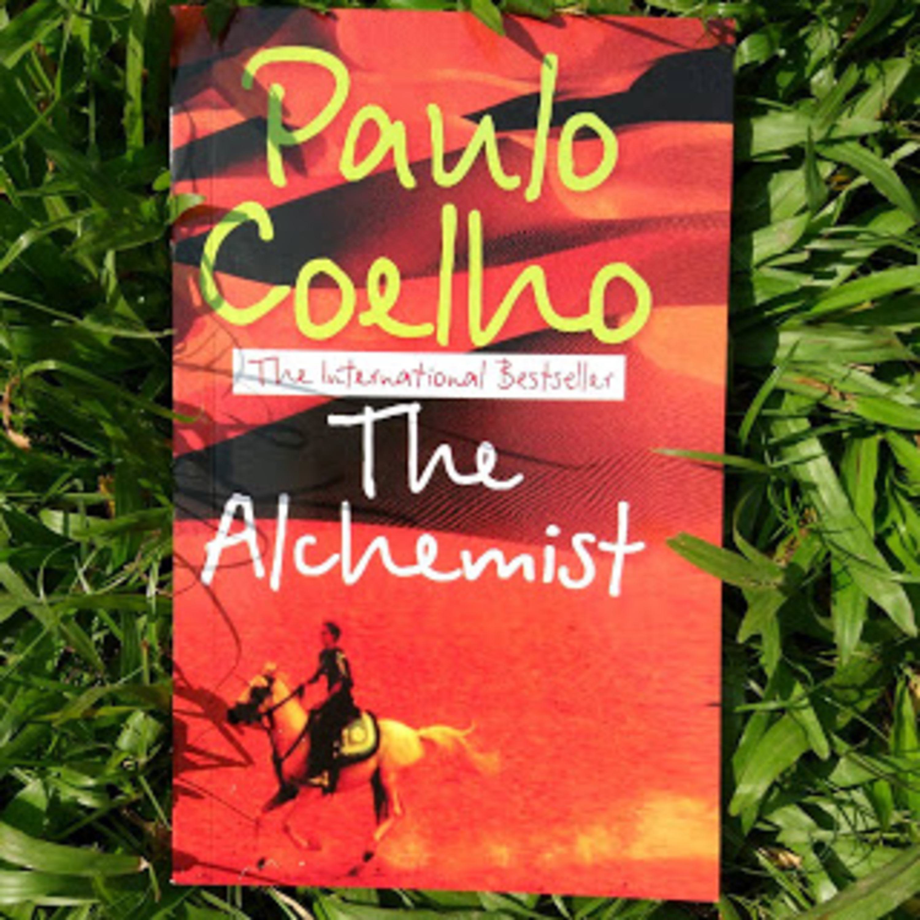 A Book Review - The Alchemist By Paulo Coehne contrasted With The Wizard of OZ episode artwork
