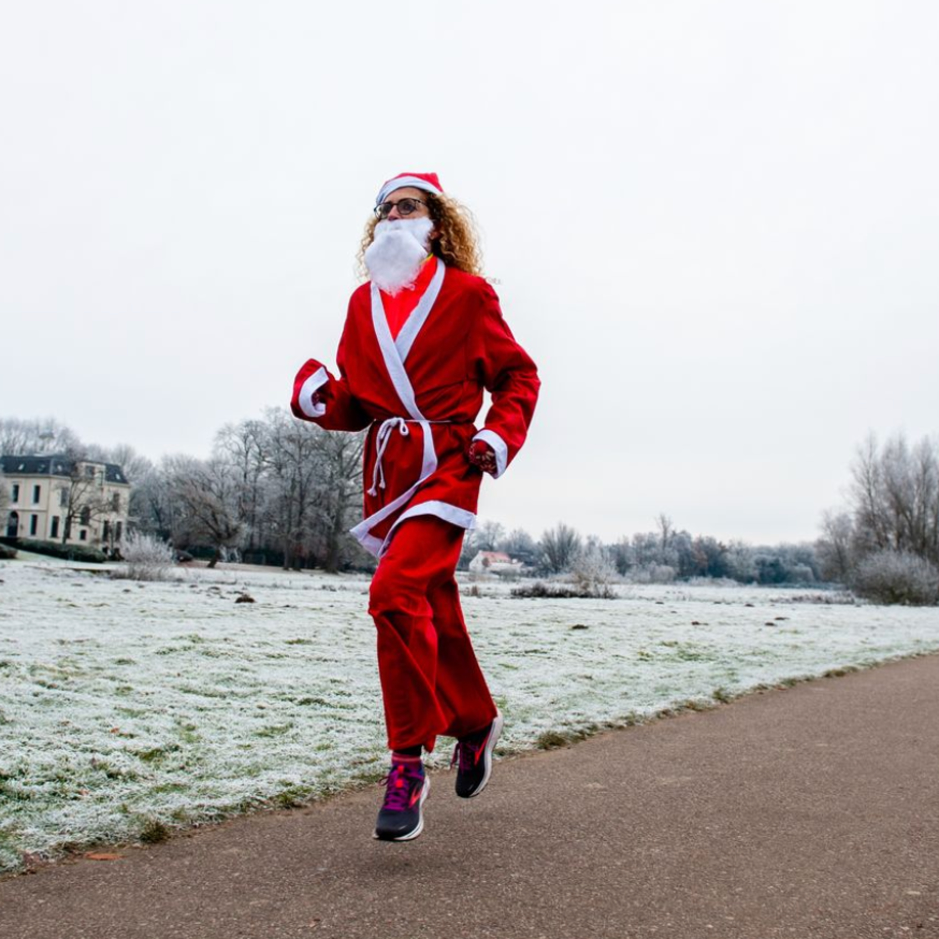 Romy Fernandez captures a woman on a Santa costume run in the Netherlands  episode artwork