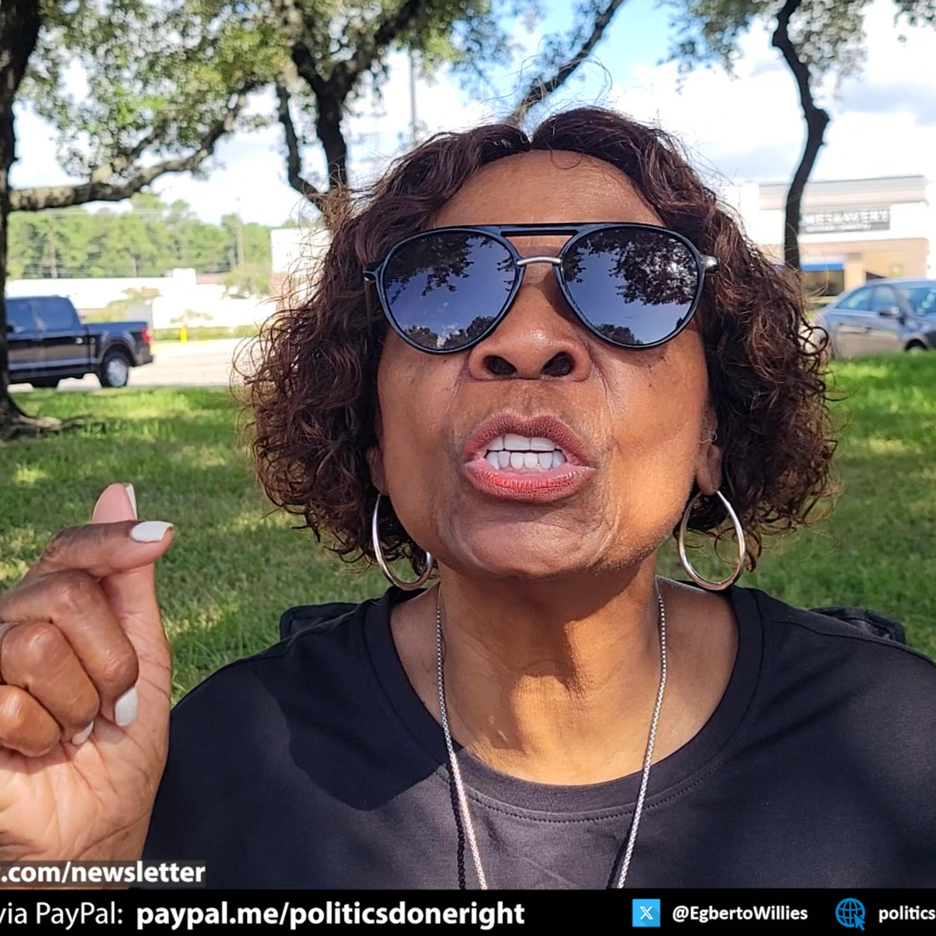 A 'Fight the Trump Takeover' Kingwood protester: If you're not protesting, you're happy with Trump.