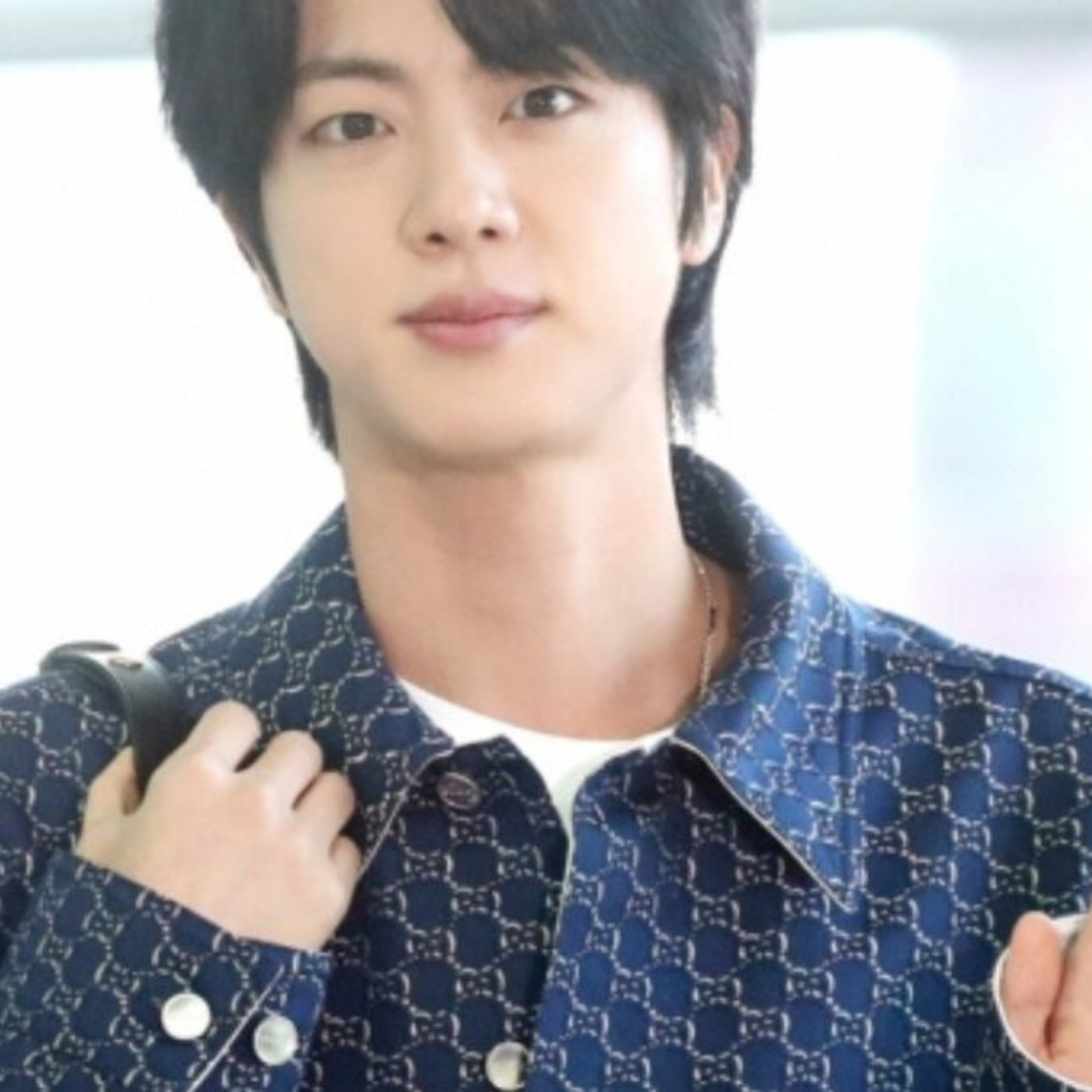 BTS’s Jin Announces Solo Comeback In May With Unique Public Advertisement
