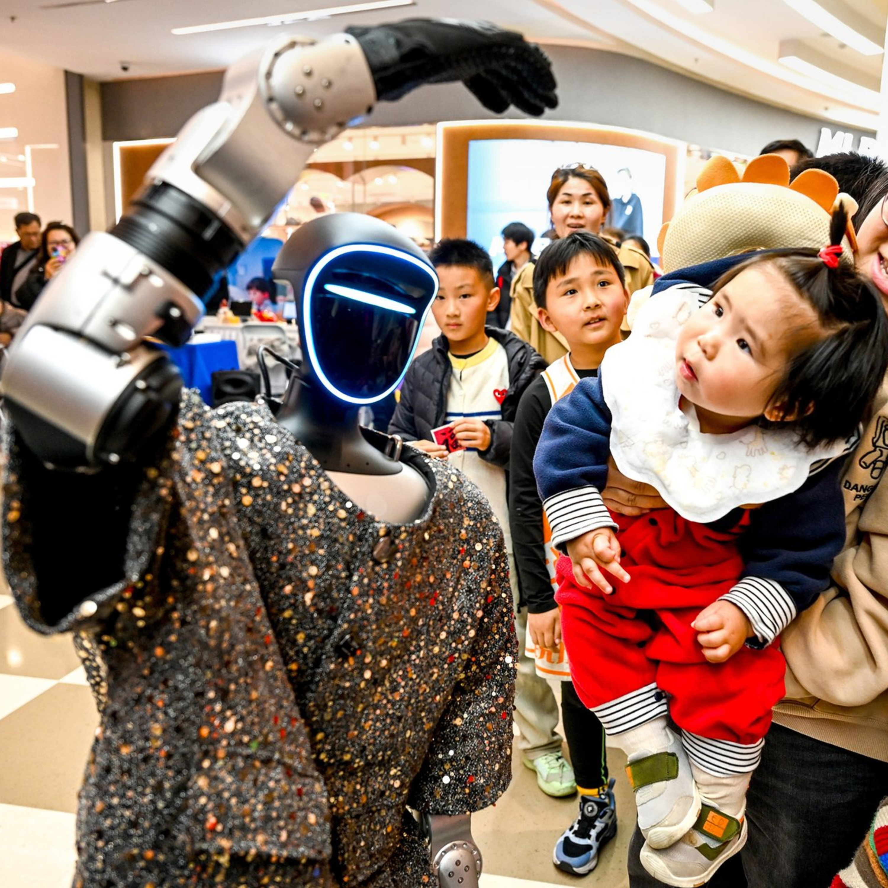 Práci lidem nevezmou AI a roboti, ale technologické firmy. Pomůže zdanění a nepodmíněný příjem?