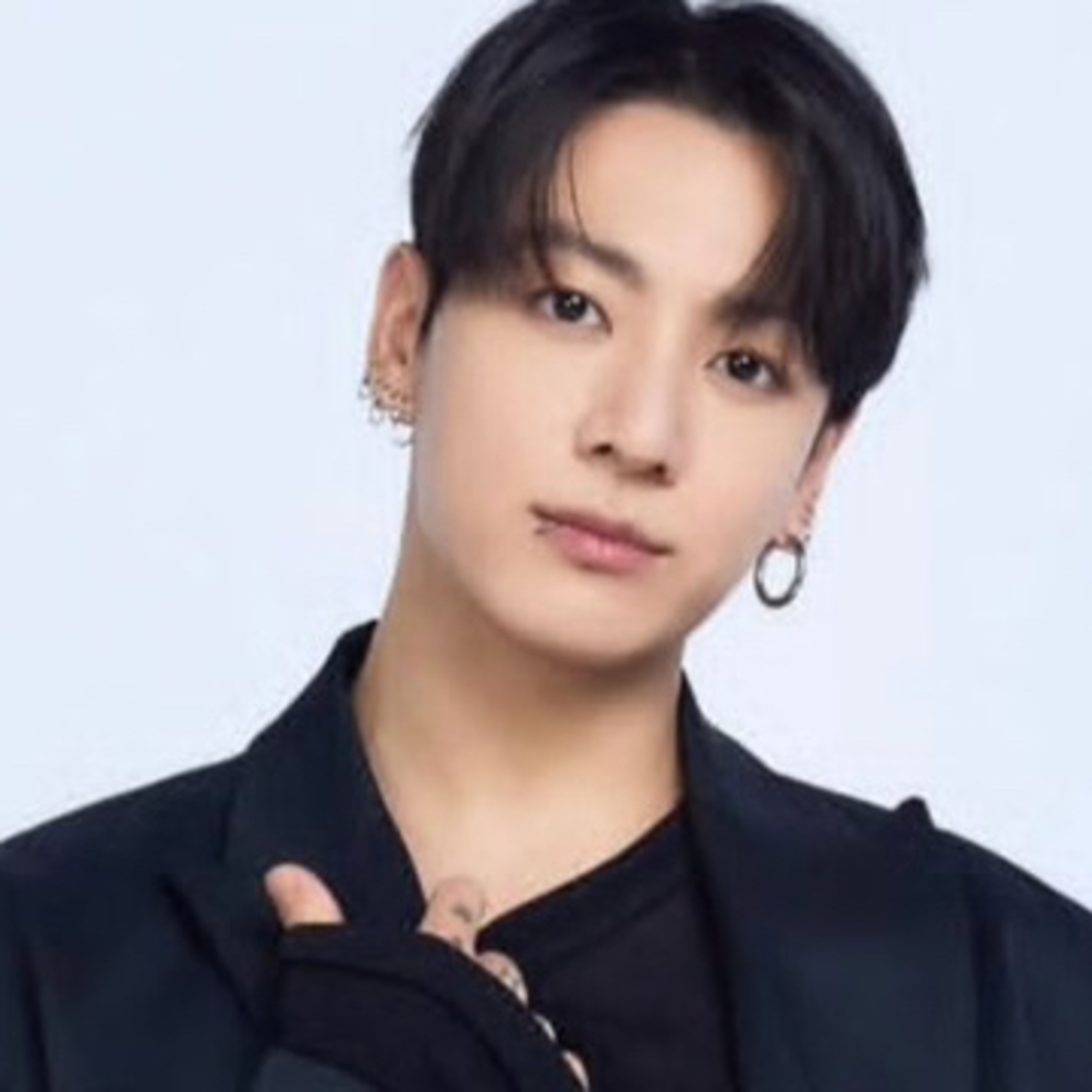 "Happy little boba ball" — Fans gush as Jungkook dances through airport crowd