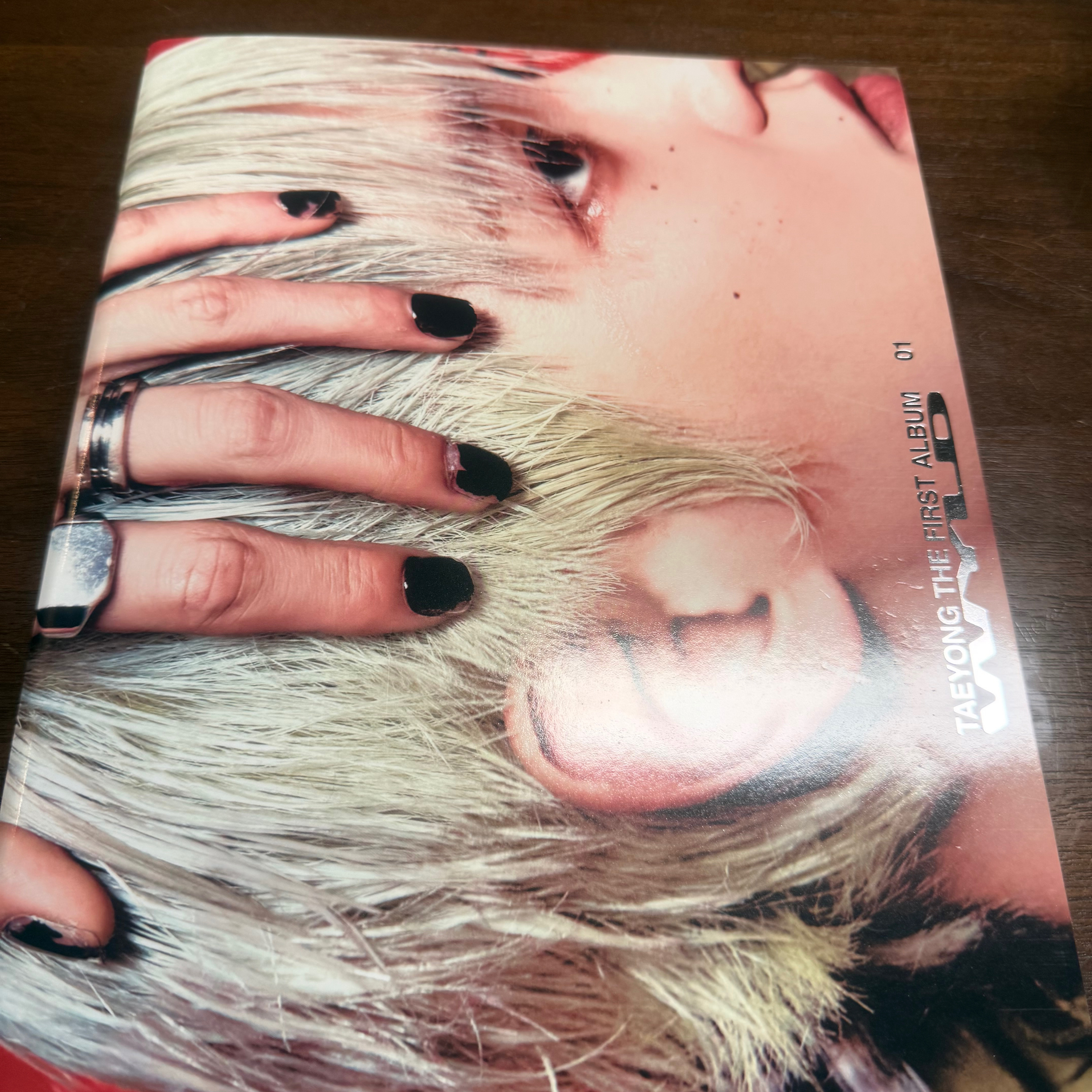 I actually bought NCT 127 leader Taeyong solo album WYLD from target store  episode artwork
