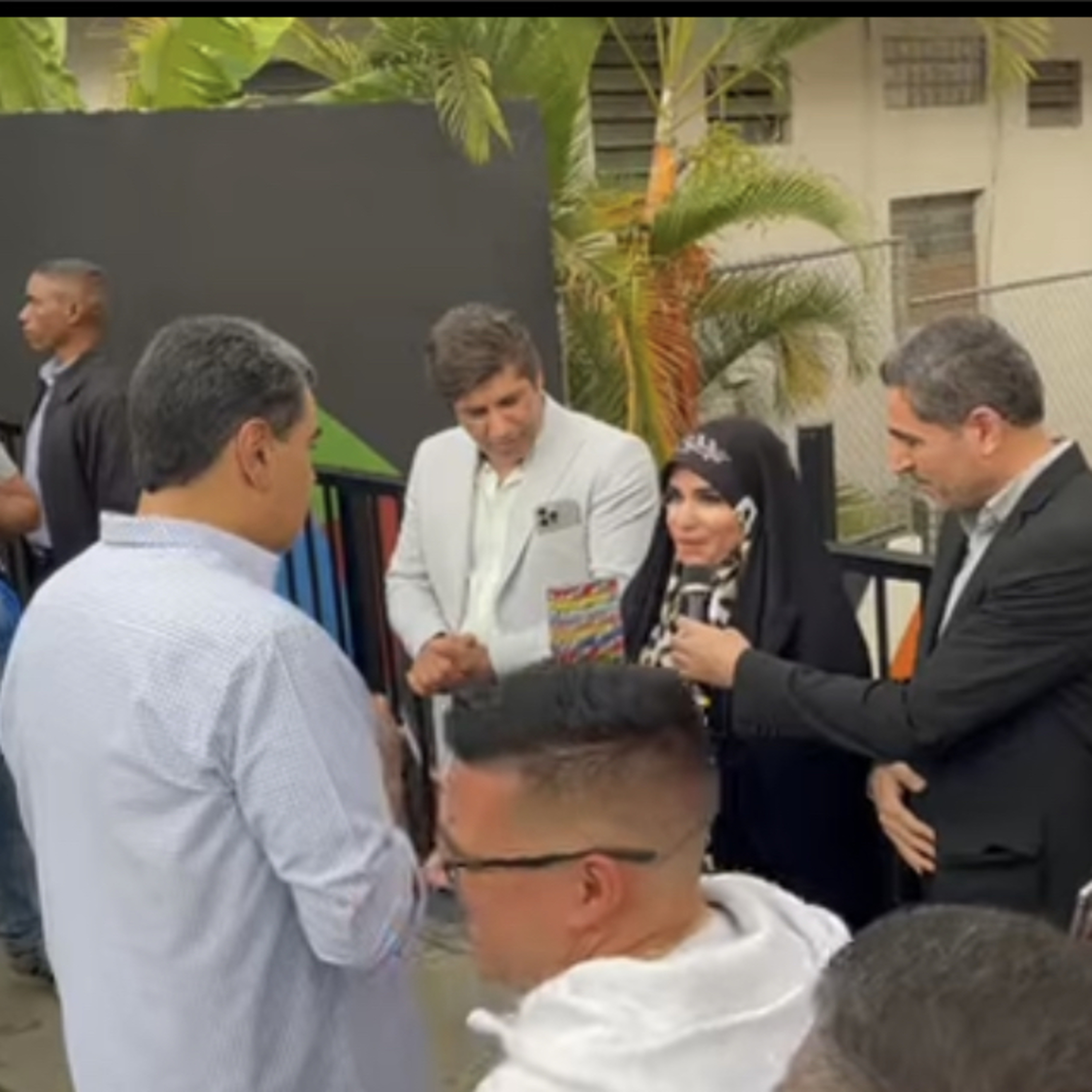 President Nicolas Maduro visits Caracas' Sarria Rebelde neighborhood and awards Sahar Emami