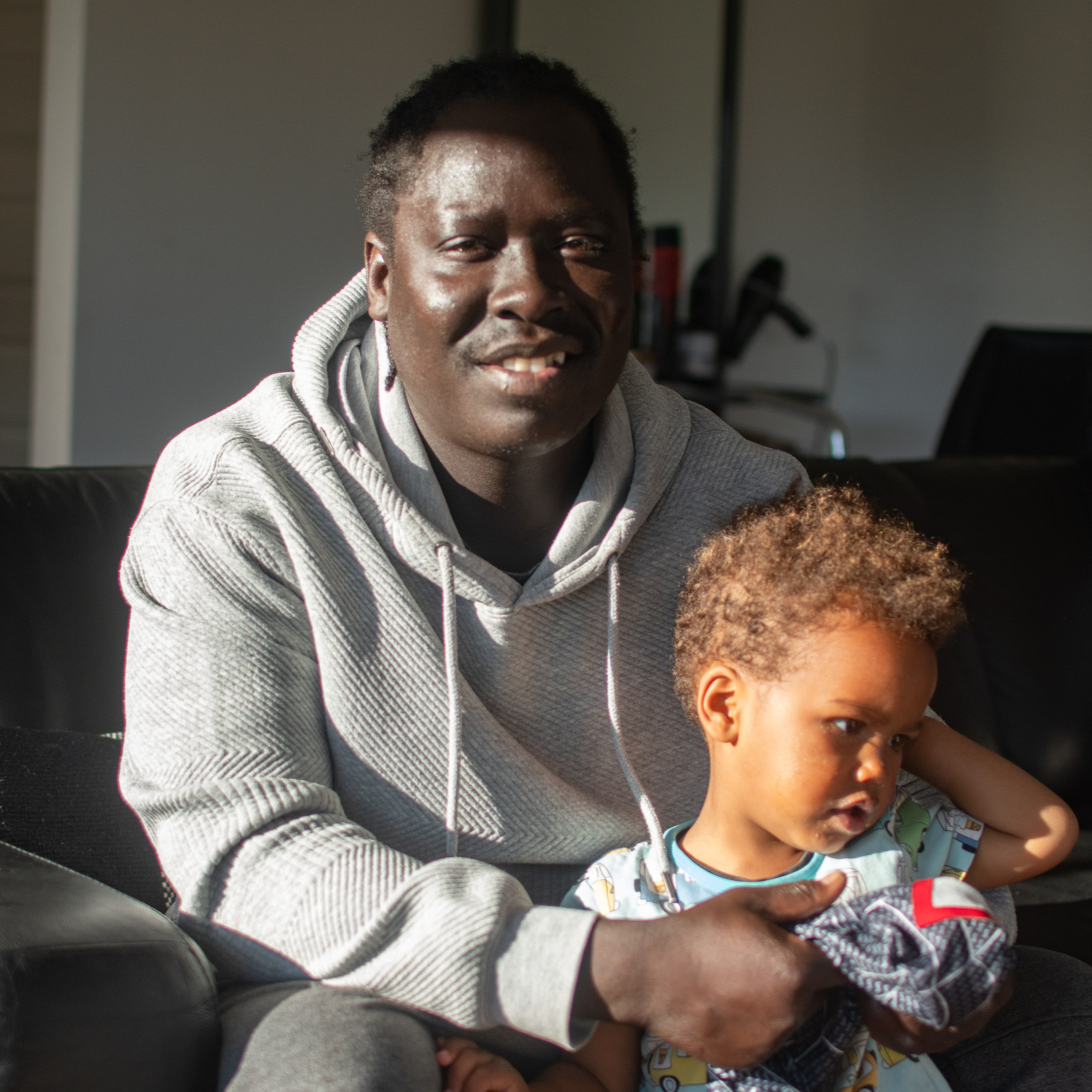 Lawrence from South Sudan: Reuniting with family and making a new home episode artwork